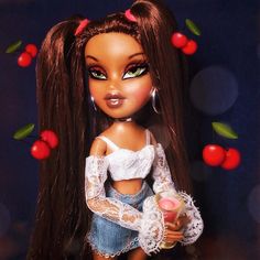 a close up of a doll with long hair holding a drink in her hand and cherries on the background