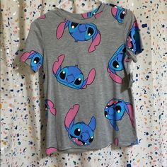 New With Tags! Disney Stitch Tshirt Women’s Small! Super Cute With Jeans! Stitch Tshirt, Graphic Band Tees, Cropped Tee Shirt, Camo Tee, Cartoon Shirts, Stitch Shirt, Tshirt Women, T Shorts, Disney Stitch