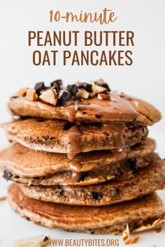 a stack of pancakes with peanut butter on top and chocolate chips on the side for toppings