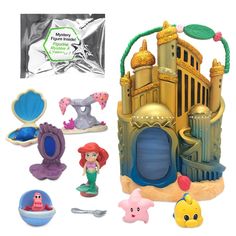 the little mermaid playset is next to other toys and accessories, including a castle