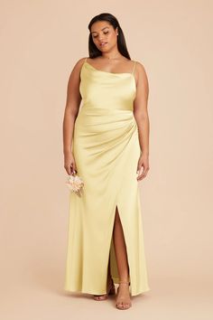 a woman in a long yellow dress