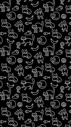 a black and white pattern with cats on it's backgroung surface