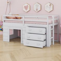 a child's bedroom with pink walls and white furniture, including a desk and bed