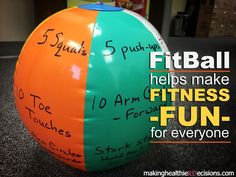 a beach ball with writing on it that says fitball helps make fitness fun for everyone