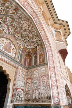 an intricately decorated archway in the middle of a building