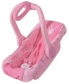 a pink baby seat with a crown on it