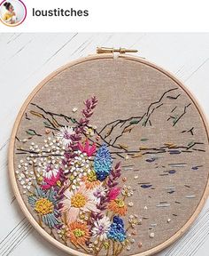 an embroidery project with flowers on it