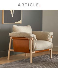 a chair that is sitting in front of a wall with the words article on it