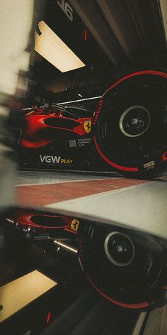 the front wheels of a racing car in motion