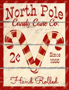 a sign that says north pole candy cane co and has two candy canes on it