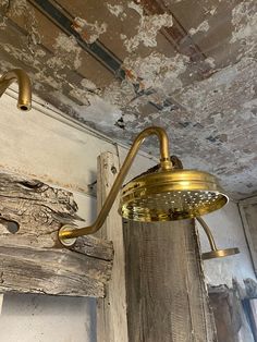 Luxury Bathroom with a Ceiling Shower Head in Brass. Elevate your bathroom design with the timeless charm of an old brass shower head. Perfect for ceiling-mounted installations, these fixtures bring vintage-inspired elegance and functionality to any space. Whether you're updating your bathroom or creating a luxury retreat, a ceiling shower head in brass adds a sophisticated touch that combines style and practicality. #OldBrassShowerHead #CeilingShowerHead