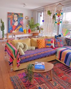 a living room filled with lots of colorful furniture