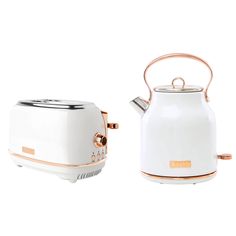 two white toasters with gold trimmings are next to each other on a white background