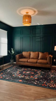 a living room filled with furniture and a rug