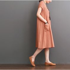 Orange cotton dresses summer short sleeve maxi dressThis dress is made of cotton linen fabric, soft and breathy, suitable for summer, so loose dresses to make you comfortable all the time.Measurement: Size M length 100cm / 39" Bust 100cm / 39" Shoulder 37cm / 14.43" Waist 128cm / 49.92" Sleeve Length 11cm / 4.29" Armhole 44cm / 17.16" Size L length 101cm / 39.39" Bust 104cm / 40.56" Shoulder 38cm / 14.82" Waist 132cm / 51.48" Sleeve Length 12cm / 4.68" Armhole 46cm / 17.94"Materials used: Cotton Cotton Solid Color Midi Dress For Beach, Beach Cotton Midi Dress In Solid Color, Cotton Midi Dress For The Beach, Casual Solid Color Short Sleeve Midi Dress, Casual Short Sleeve Solid Color Midi Dress, Summer Cotton Midi Length Short Sleeve Dress, Cotton Short Sleeve Midi Dress For Summer, Solid Color Short Sleeve Midi Dress For Beach, Short Sleeve Solid Color Midi Dress For Beach