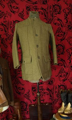 More items on www.newfanglednatty.com You can not get any better than these Zacharias  vintage Derby Tweed sporting jackets, fully loaded design as described below: The jacket is in  Grey Olive hard wearing Derby Tweed. There is a water resistant 'drop liner' made from a luxury thick Viscose.  A drop liner so called because it is attached at the top of the garment but not at the bottom to allow water that soaks through the tweed outer layer to run off.  The jacket has the quality Norfolk jacket Vintage Stand Collar Winter Blazer, Vintage Single-breasted Outerwear With Stand Collar, Fitted Outerwear With Welt Pockets For Outdoor, Vintage Stand Collar Outerwear For Work, Vintage Khaki Winter Blazer, Vintage Stand Collar Blazer For Work, Vintage Outerwear With Stand Collar For Work, Vintage Stand Collar Blazer For Fall, Vintage Khaki Blazer With Pockets