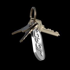 a keychain with two keys attached to it