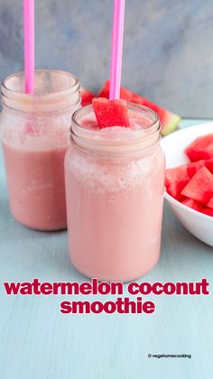 two mason jars filled with watermelon coconut smoothie next to slices of watermelon