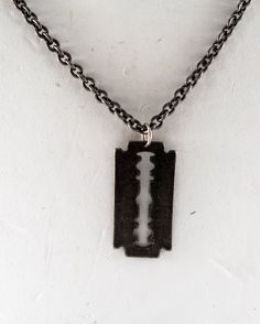 Designer Necklace Razor Blade Pendant On Gunmetal Cord Chain New 24" Great 1990's Necklace with great Gothic Cross Pendant. Gunmetal Link Chain  with Gunmetal Razor Blade Pendant. 24" Chain. Gunmetal Chain Necklace As Gift, Gunmetal Chain Necklace For Gift, Blade Necklace, Gothic Cross, Gothic Crosses, Razor Blade, Designer Necklace, Last Minute Gifts, Necklace Designs