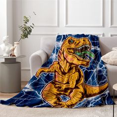 a t - shirt dinosaur on a blue background with lightning in the background is a throw blanket