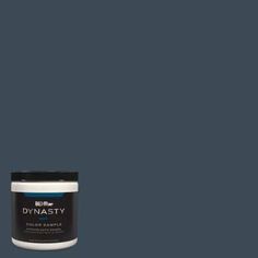 a can of dymasty paint on a gray background