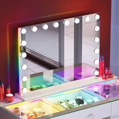 an illuminated vanity mirror with lights on it in a room that has red walls and flooring