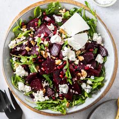 a salad with beets, feta cheese and walnuts