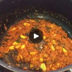 the food is being cooked in the pot on the stove top and ready to be eaten