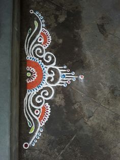 an intricately painted design on the ground