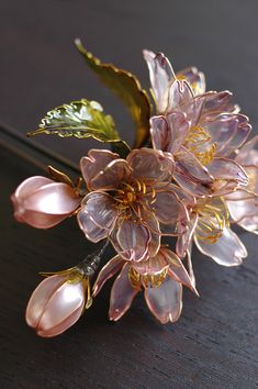 a close up of a flower on a table