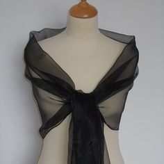 "This black organza wrap/shawl would be perfect for bridesmaids, prom, wedding guest or going to the races.  Black satin dolly bags available. It has a soft draping quality. It has a roll edge finish. Dimensions 78\" x 18\"                        200 cm x 46 cm Gentle wash,    do not tumble dry" Navy Blue Bridesmaids, Wedding Shawls, Evening Scarf, Evening Wrap, Evening Wraps, Evening Shawls, Chiffon Shawl, Etsy Wedding Favors, Bridal Shawl