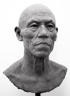 an old man's head is shown in black and white