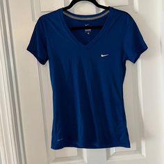 V Neck White Nike Symbol Dry Fit Thin And Airy Nike Azul, Nike Symbol, Tops Nike, Nike Swim, Swim Shirts, White Nike, Future Fashion, Blue Nike, Athletic Outfits