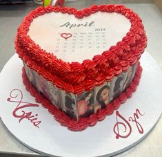 a heart shaped cake with pictures on it