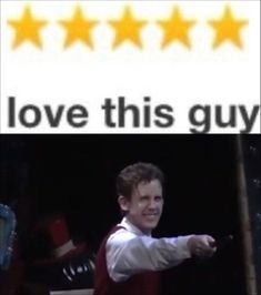 there is a man that is pointing at the camera and has five stars on it