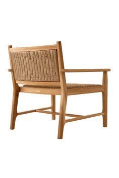 a wooden chair with wicker seat and armrests on an isolated white background