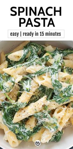 spinach pasta in a white bowl with text overlay that reads spinach pasta easy, ready in 15 minutes