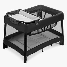 a baby crib that is black and white