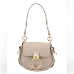 Chlo Top Handle Bag Neutrals Leather Gold-Tone Hardware Flat Handle Suede Lining & Single Interior Pocket Snap Closure At Front Handle Drop: 6.75" Depth: 3" Height: 8.25" Width: 8" Color: Light Tan Purchased Off Of The Real Real, No Long Strap Came Originally Chloe Tess Bag, Chloe Tess, The Real Real, Chloe Bags, Real Real, Bag Light, Chloe Bag, Light Tan, Handle Bag