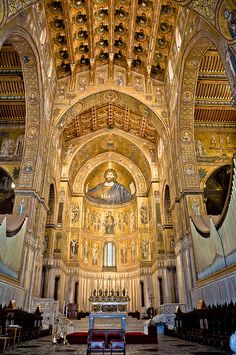 the inside of a church with high ceilings