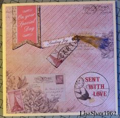 a card with stamps and some type of paper on it that says send with love