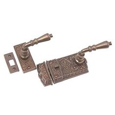 an antique style door handle and latch