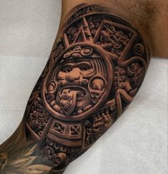 a man with a tattoo on his leg