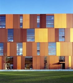 an orange building with lots of windows on it