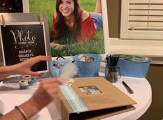 a table topped with pictures and other items