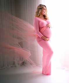 This stunning gown is unique, figure-flattering and comfortable. We're obsessed with the body-con mermaid fit with a long sheer top layer that adds a dramatic effect! Ideal for maternity photos. Style with our adorable flower crown! Pink Size: S/M (78" length, 34-38" bust), M/L (78" length, 35-41" bust), L/XL (78.5" length, 37-45" bust), XL/2XL (78.5" length, 38-47" bust) Questions? Use the chat icon to connect with a stylist! Flower Crown Pink, Maternity Stores, Chat Icon, White Maternity Dresses, Mermaid Fit, Crown Pink, Gender Reveal Gifts, Top Skin Care Products, Work Skirts