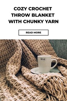 Cozy crochet throw blanket with chunky yarn and a coffee mug on top. Housewarming Crochet Blanket, Crochet Throw Pattern Free Chunky Yarn, 10mm Crochet Hook Pattern Blanket, Brown And White Crochet Blanket, Bulky Yarn Afghan Patterns Crochet, Chunky Basket Weave Crochet Blanket, Super Bulky 6 Crochet Blanket Pattern Free, Fast Chunky Crochet Blanket, Crochet Pattern For Chunky Yarn