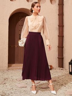 Luxury Elegant Skirt For Holidays, Luxury Elegant Pleated Skirt For Spring, Luxury Pleated Long Skirt, Chic Luxury Skirt For Day Out, Luxury Feminine Skirt For Fall, Black Fall Skirts, Luxury Chic High-waist Pleated Skirt, Luxury High-waist Chic Pleated Skirt, Luxury Elegant Holiday Skirt