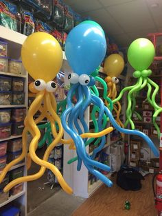 some balloons that are in the shape of octopuses