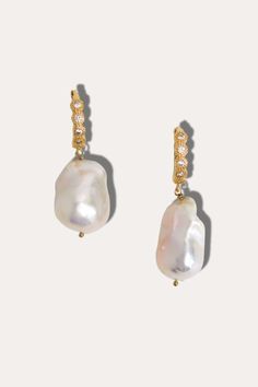 Embrace the opulence of our Baroque Chunky Pearl Earrings, where classic beauty meets contemporary charm. Each earring features a lustrous, oversized baroque pearl, renowned for its unique shape and iridescent sheen, making every piece a one-of-a-kind treasure. Protect your demi-fine jewelry by removing it during activities like washing hands, swimming, exercising, cleaning, and applying personal body products. Maintain shine by avoiding contact with soaps, perfume, lotion, makeup, and cleaning Chunky Pearls, April Birthstone Jewelry, Baroque Pearl Earrings, March Birthstone Jewelry, Forever Jewelry, Demi Fine Jewelry, Men's Jewelry Rings, Fine Jewelry Gift, Pearl Jewellery Earrings